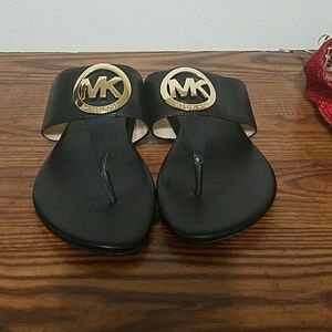 black 7 1/2 Michael Kors Gold Mk logo sandals